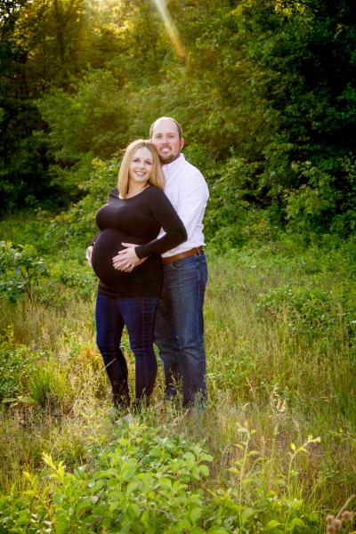 Pregnancy Photography Toledo Ohio in a field at sunset Pregnancy Photography Toledo Ohio in a field at sunset