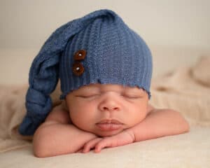 Toledo Newborn Photographer baby sleep hat on