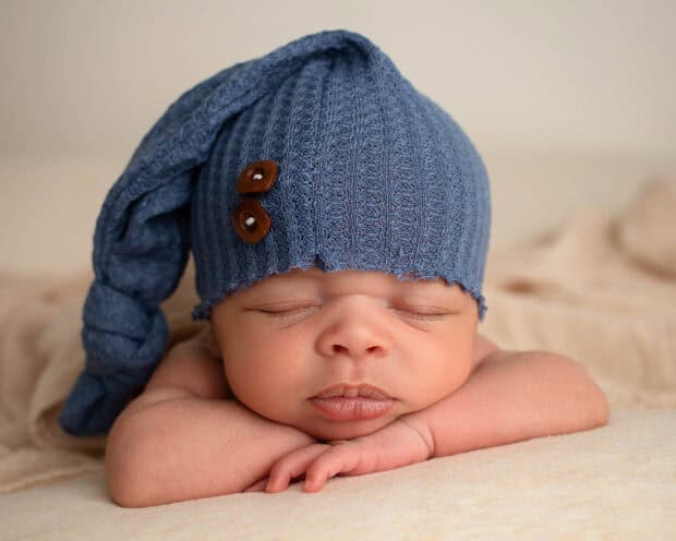 Toledo Newborn Photographer baby sleep hat on