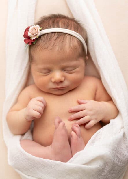 Toledo Newborn Photographer baby girl in a swaddle